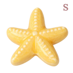 Dijes de estrella de mar de cerámica